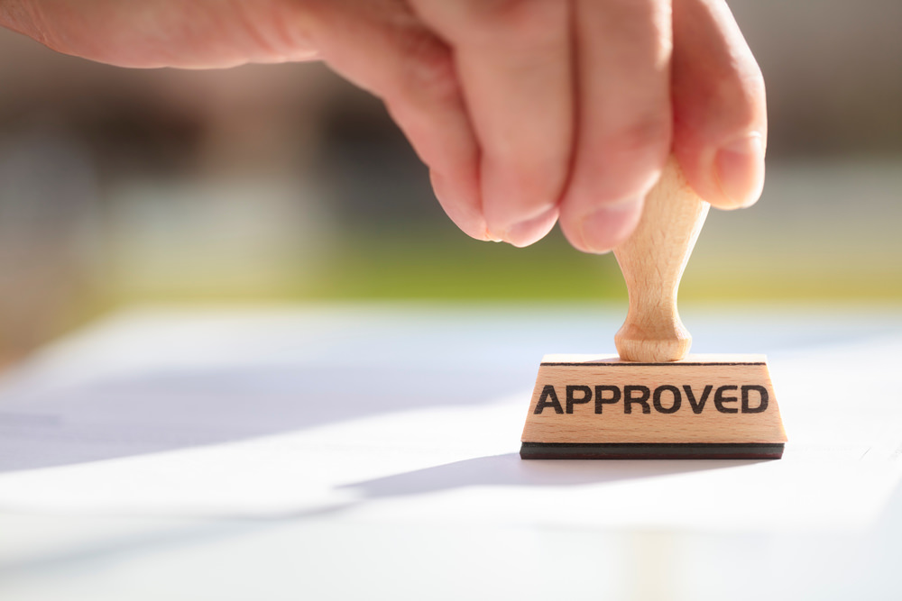 Businessman,Or,Notary,Public,Stamping,Approved,Stamp,On,Document,In How Can I get Approved for a Low Doc or Alt Doc home loan?