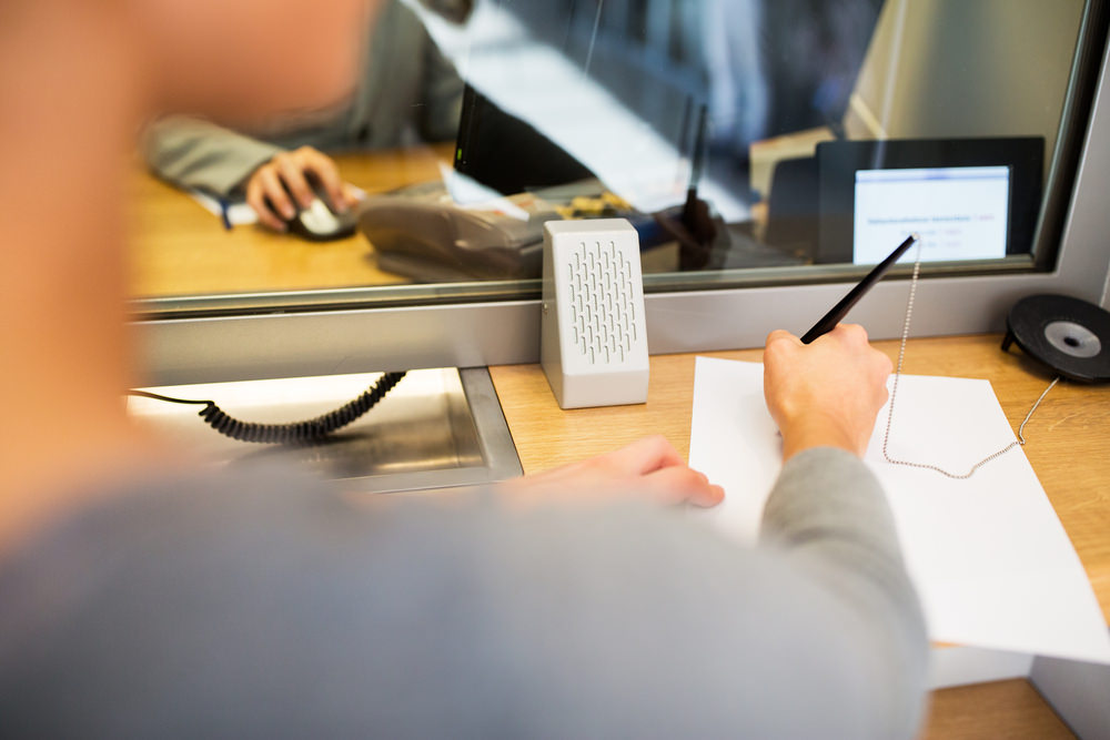 People,And,Finance,Concept,-,Customer,With,Pen,And,Paper Bank