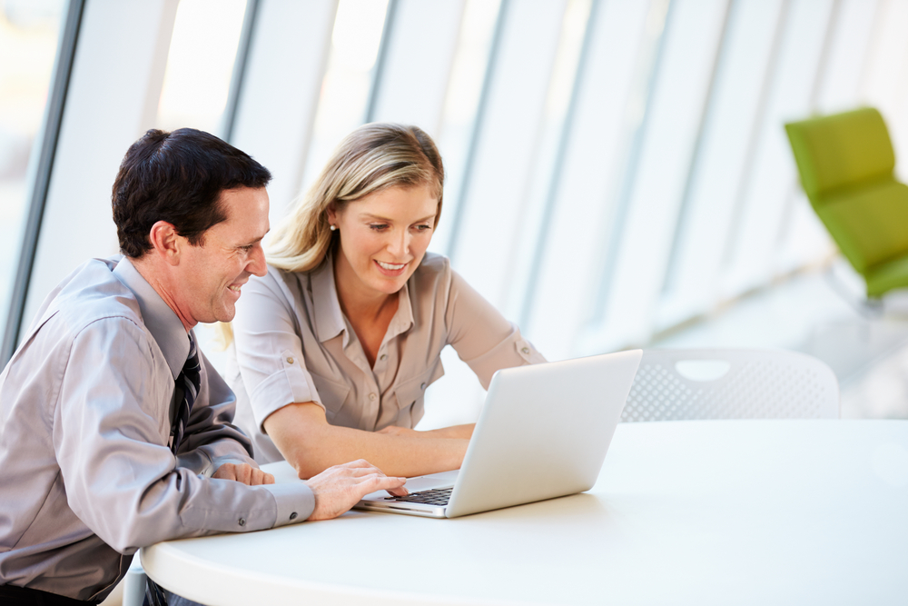 Man and Woman Discussing Home Loans for Discharged Bankrupt