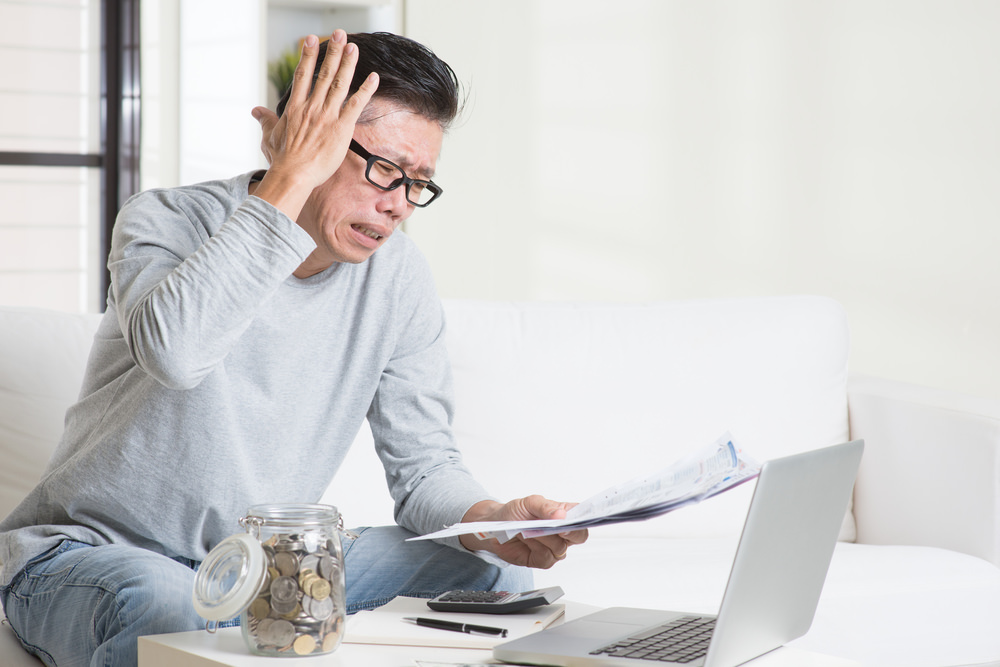 Portrait,Of,50s,Mature,Asian,Man,Having,A,Hard,Time Bad Credit Home Loans